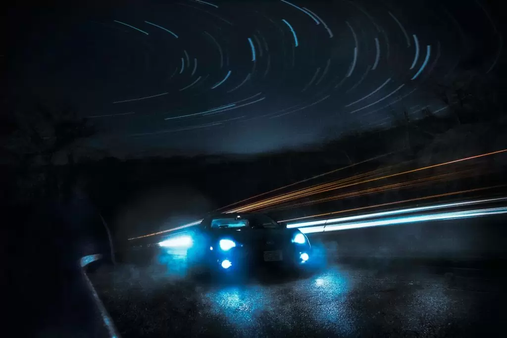 cars on road during night time